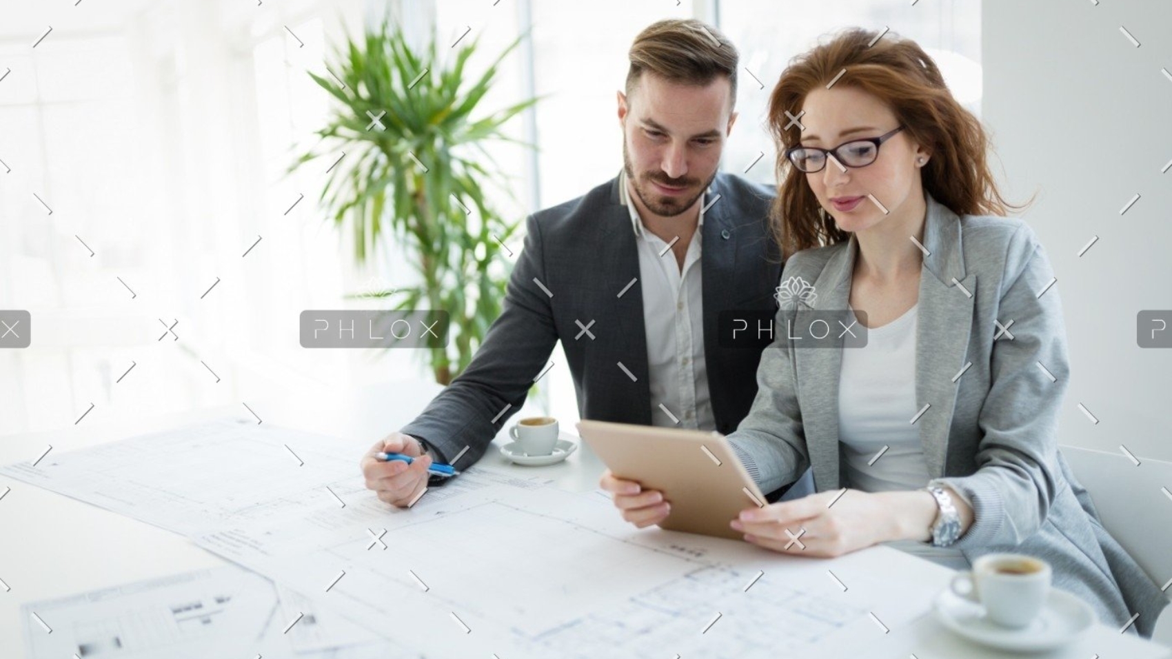 demo-attachment-596-portrait-of-young-architect-woman-on-meeting-KFZCE3A